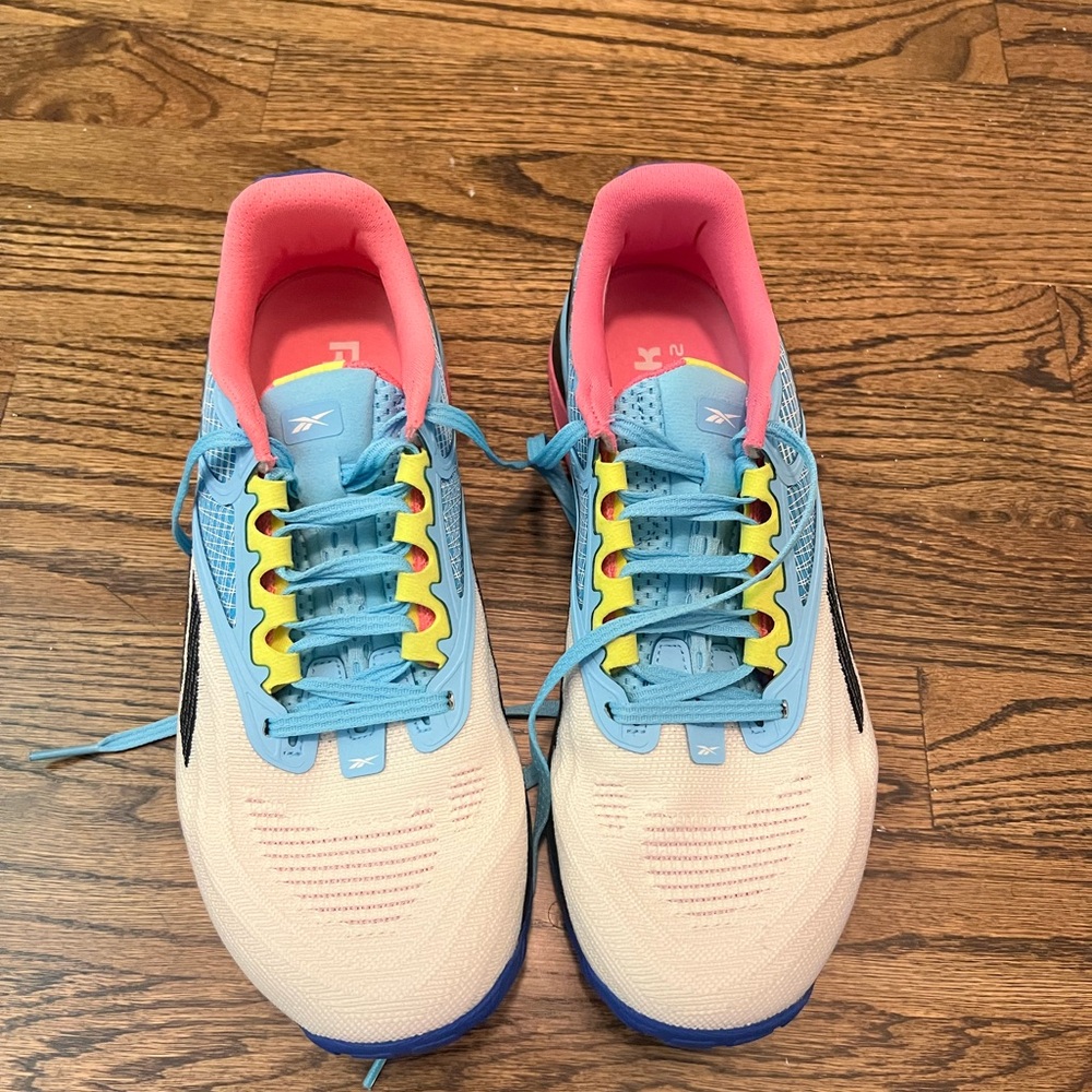 Reebok Cream and Blue Sneakers with Vibrant Design